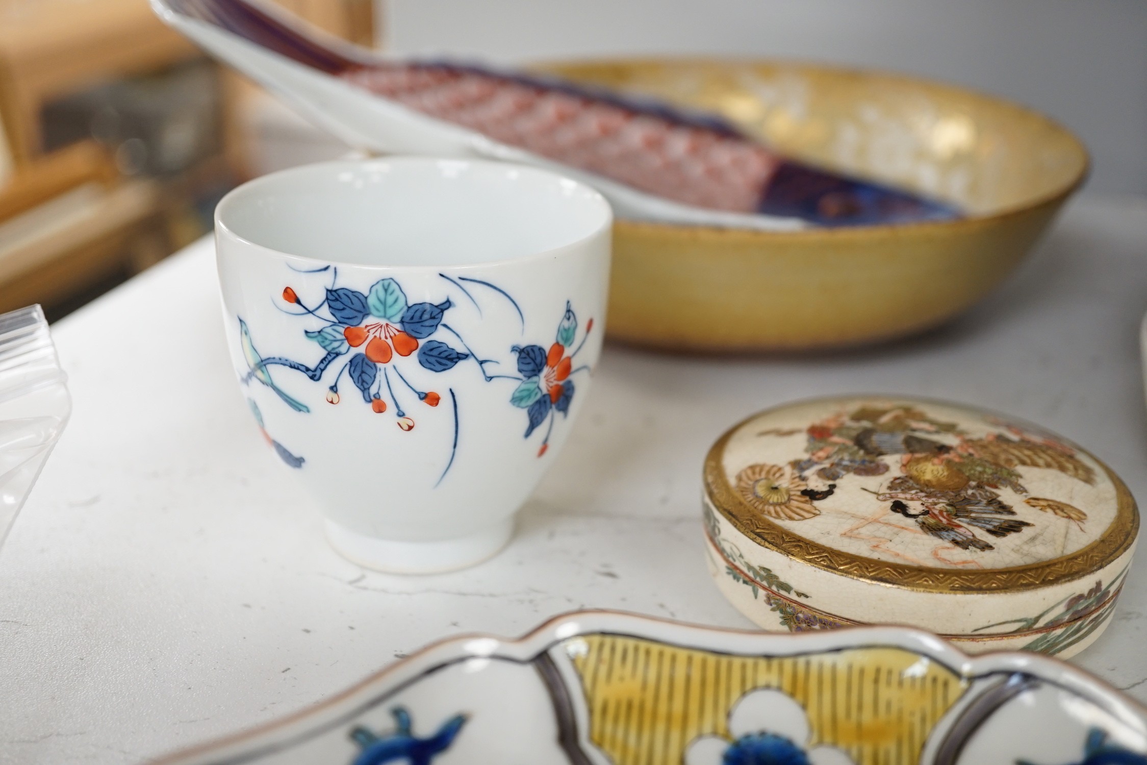 A group of 19th/20th century Japanese ceramics, Including five dishes, three vases, a cup, a Satsuma box and cover and a model of a dog